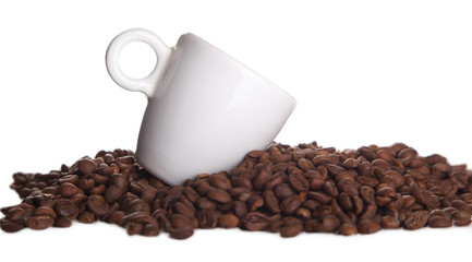 cup in coffee grains isolated