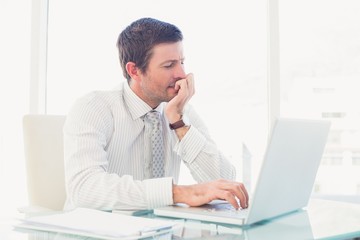 A businessman working at desk