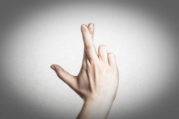 Finger kreuzen