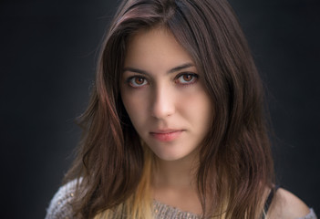 Naklejka premium Portrait of a beautiful brunette. Close-up.