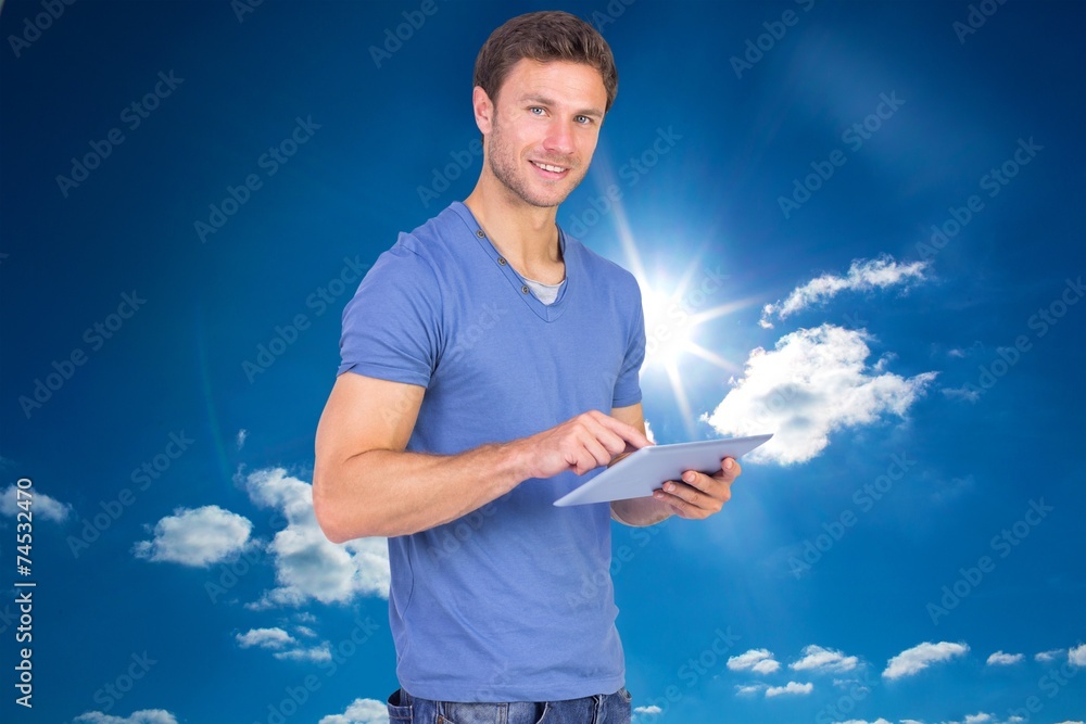 Aufkleber composite image of man scrolling through tablet pc