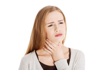 Naklejka premium Portrait of a woman with throat pain