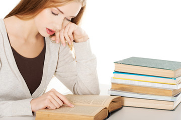 Tired woman preparing to exam