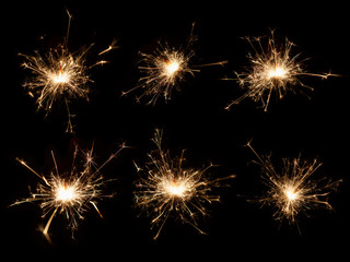 Naklejka premium Christmas sparkler on black background