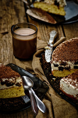 cheesecake with prunes and chocolate cut on pieces