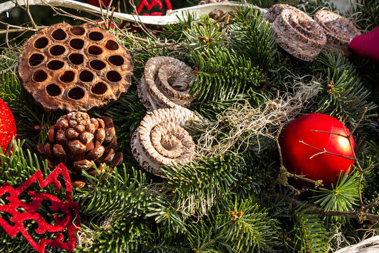 christmas background with toys, cake and fir-cones on fir tree b