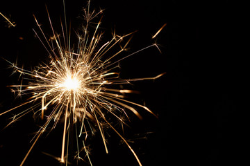 Christmas sparkler on black background