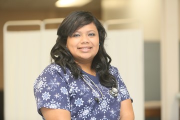 Female Hispanic Nurse, looking back
