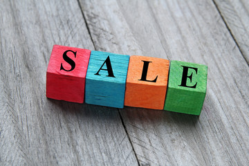 sale concept on colorful wooden cubes