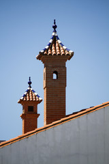 Fototapeta na wymiar traditional spanish chimneys from Aracena, Spain.