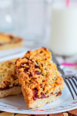 pie pastry with apple jam and milk in a glass bottle