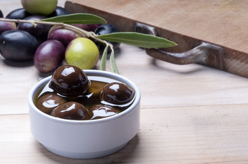 black olive on a wodden board