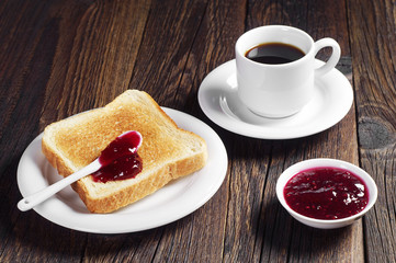 Toast with jam and coffee