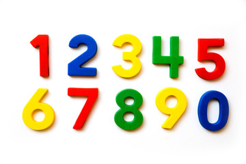 magnetic multi-coloured figures on a white background isolated