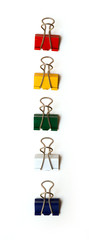 five colored clips on a white background