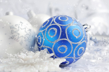 Christmas blue and silver decorations on festive background