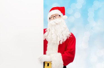 man in costume of santa claus with billboard