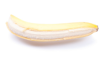 peeled ripe banana isolated on a white background with shadow