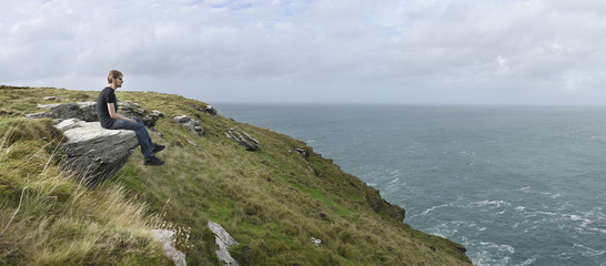 Coastal Grass Hill at Tintagel Castle, Cornwall, UK