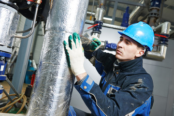 industrial worker at insulation work