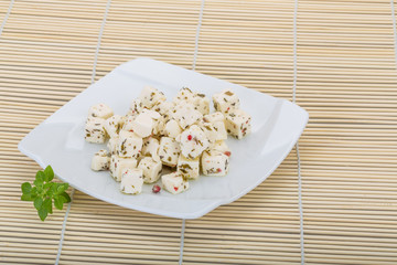 Cheese with spices and oil