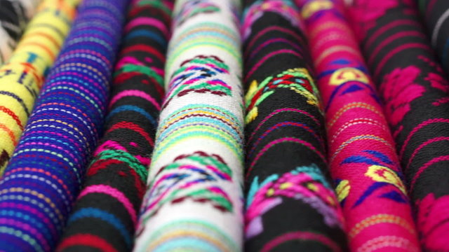 Dolly Across Traditional Mexican Fabrics