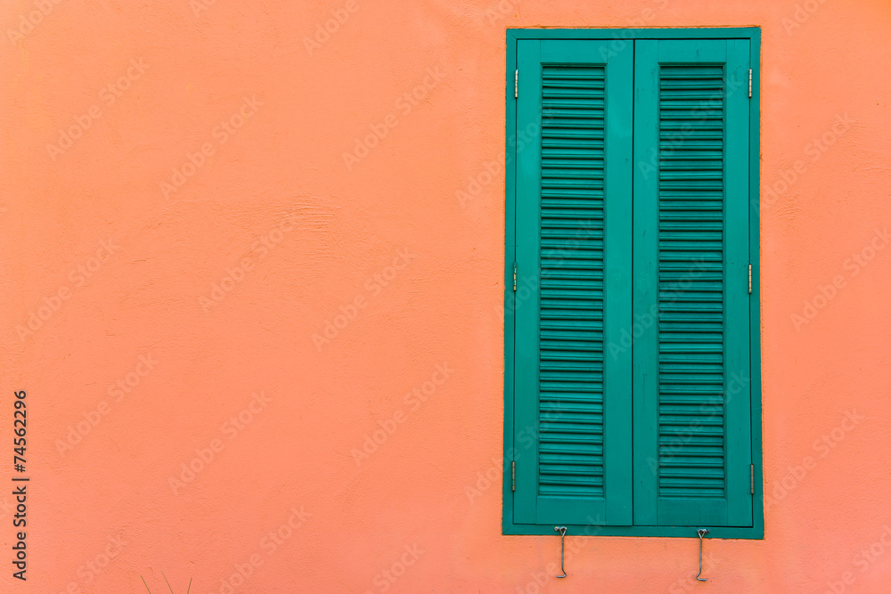 Wall mural italian style shutters in an old house