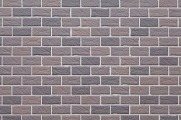 Brown brick tile wall background and texture