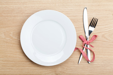 Empty plate with silverware