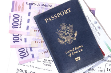 Travel documents and pesos