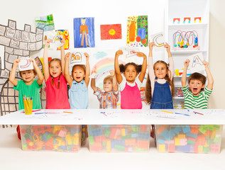 Group of little kids in early development lesson