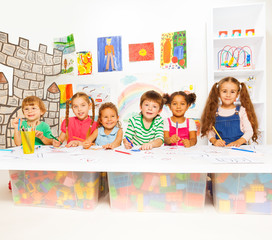 Fototapeta premium Smart little kids learning letters and reading