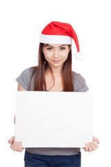 Asian girl with red santa hat hold a blank sign