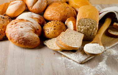Fresh healthy natural bread on a wooden background