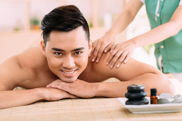 Fototapeta na wymiar Enjoying back massage