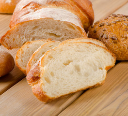 fresh white loaf  on a wooden table.
