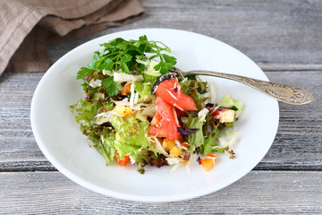 Salad with vegetables on a plate