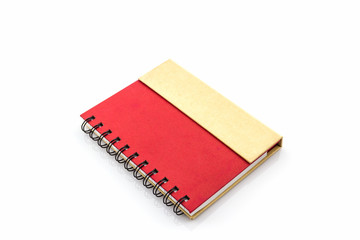 Red diary book on white background.