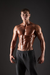Fototapeta na wymiar Strong Athletic Man Fitness Model Torso
