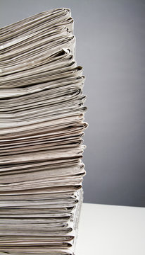 Stack of newspapers from the side