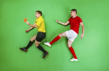Foto op Canvas Football player and referee © Halfpoint