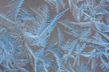 frosty pattern on the glass, closeup