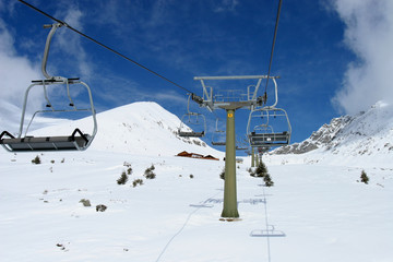 Fototapeta na wymiar Ski lift in the Italian alps