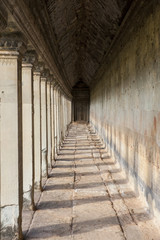 Fototapeta na wymiar Ancient corridor at Angkor Wat