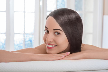 Portrait of woman with beautiful hair in spa salon
