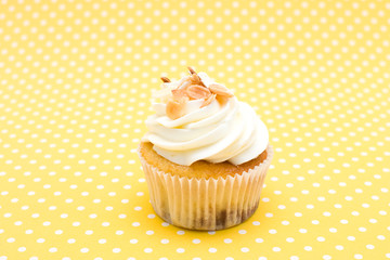 Cupcake on yellow background