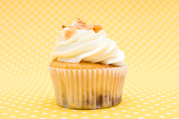 Cupcake on yellow background