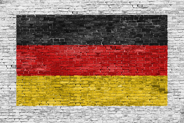 German flag painted over brick wall