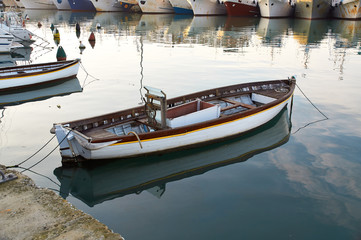 Wooden boat vintage type on offshore berth