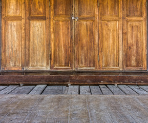 Wooden doors and floor of traditional Thai house